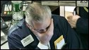 New York stock trader reacts in horror as shares plummet in March 2007
