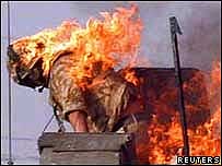 Soldier surrounded by flames