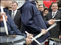 German Chancellor Gerhard Schroeder (right) and German President Horst Koehler watch parade