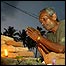 A man prays for the wife he lost to the tsunami at Peraliya, Sri Lanka